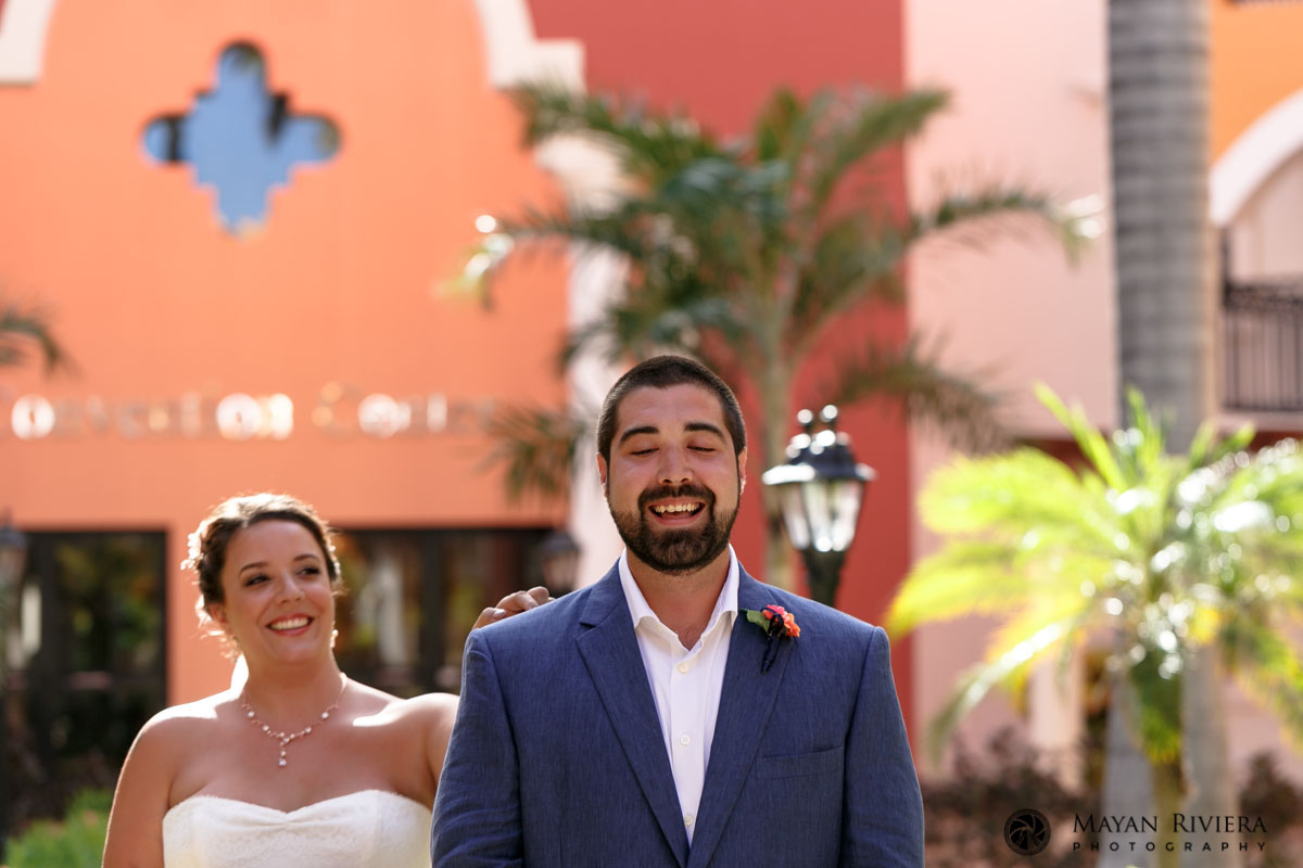 BrideTapsGroomForFirstLook