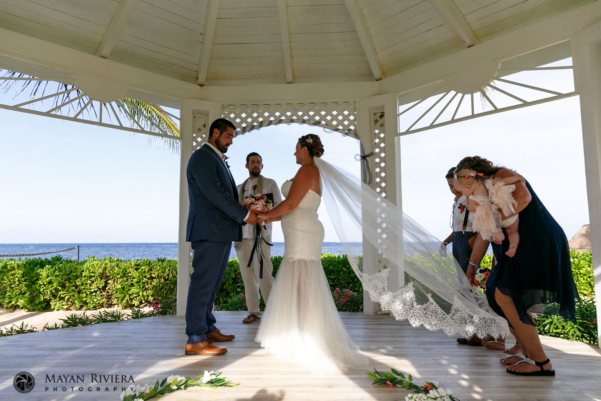 BridalVeilFloatsOnBreezeAtCeremony