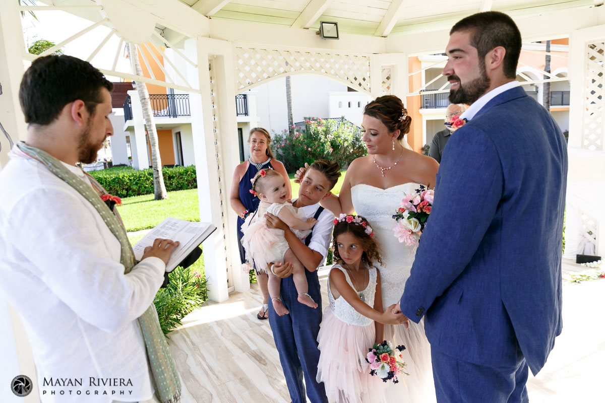 BigBrotherHoldsBabySisterAtCeremony