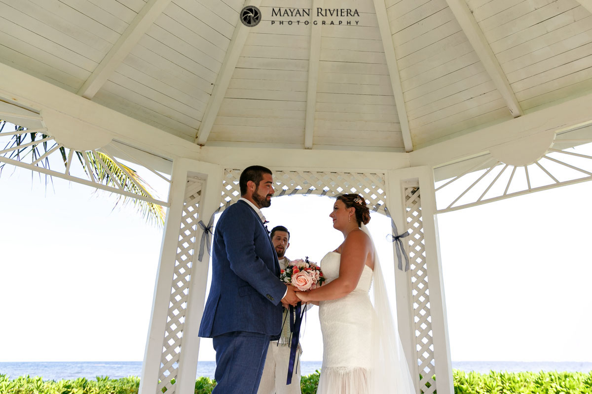 WeddingCoupleCeremonyUnderBeachsideGazebo