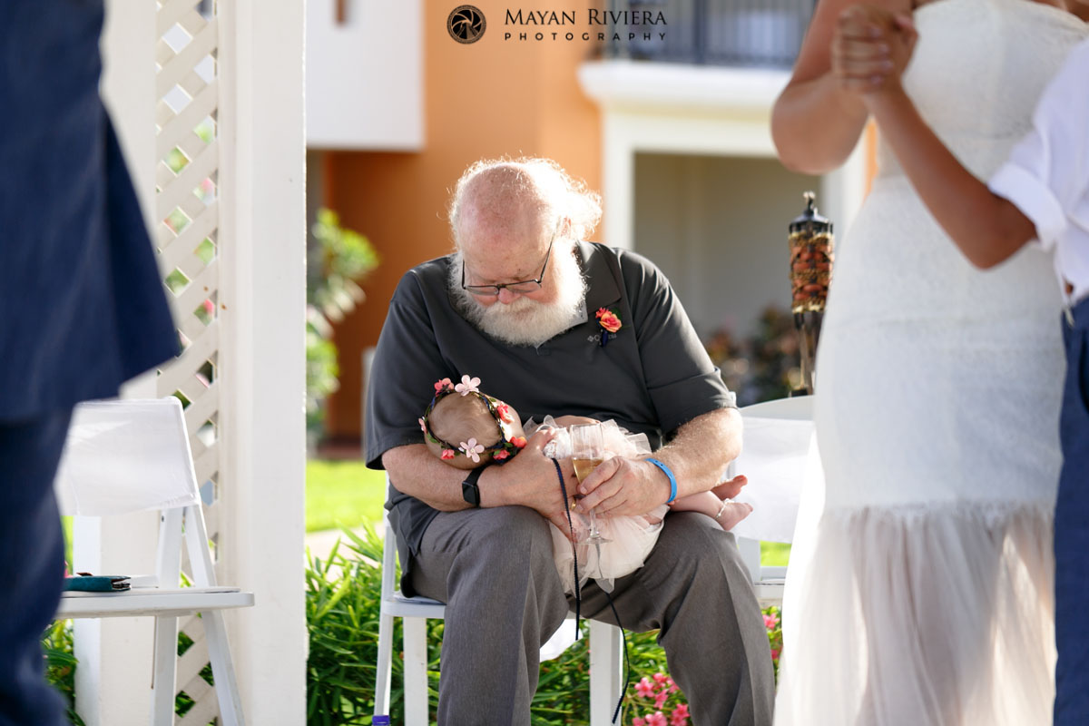 GrandpaHoldsSleepingGranddaughter