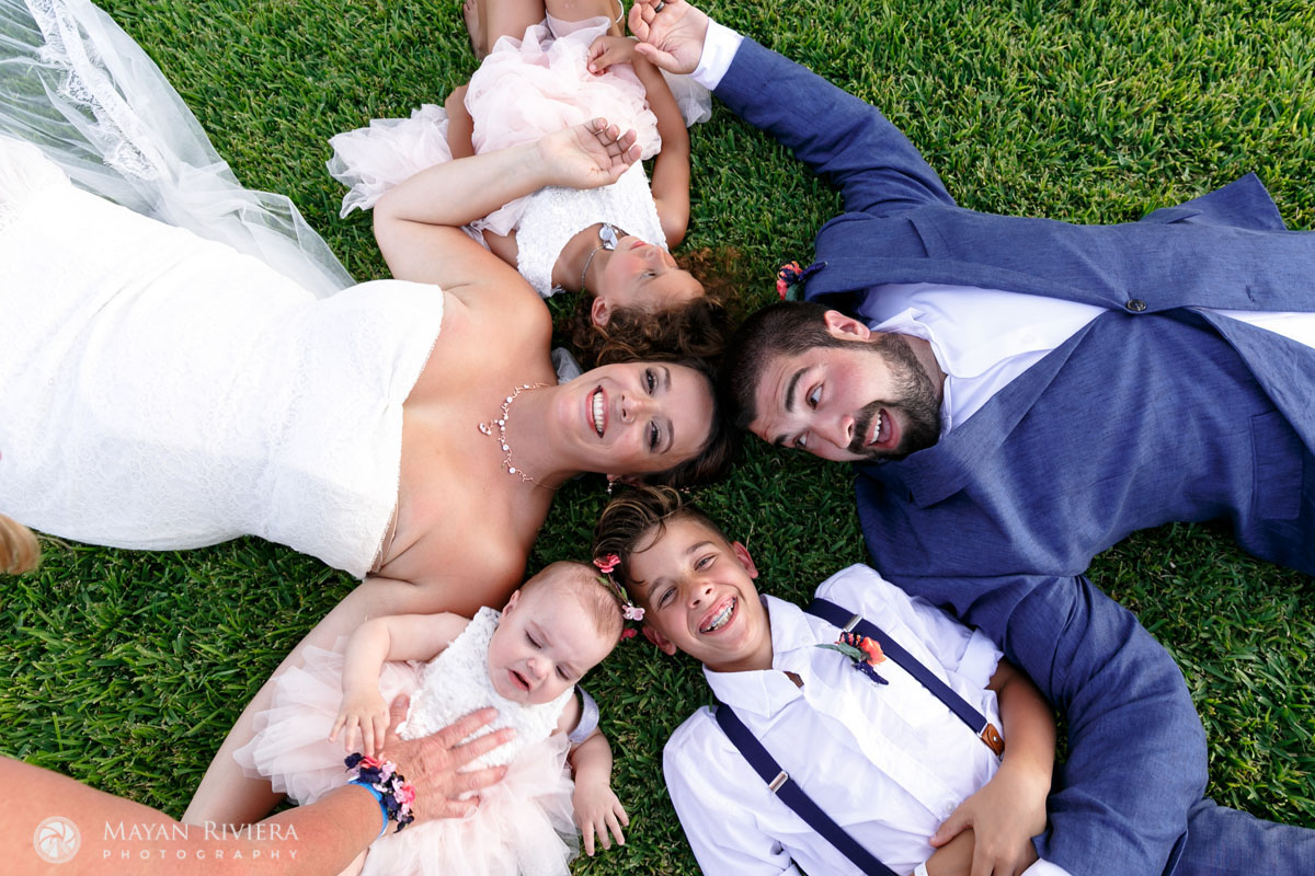 NewlywedsPoseWithBlendedFamily