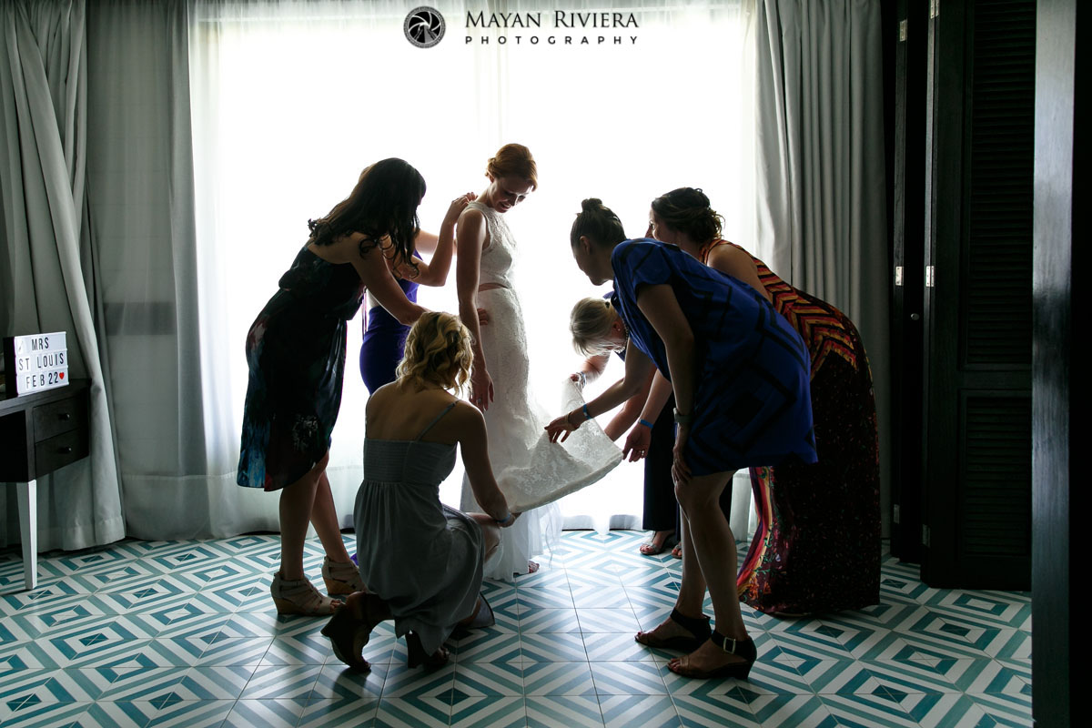BridesmaidsHelpBrideDress