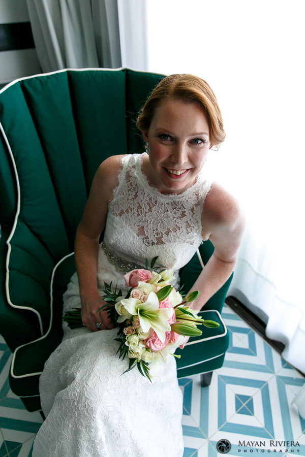 SmilingBrideSittingWithBouquet
