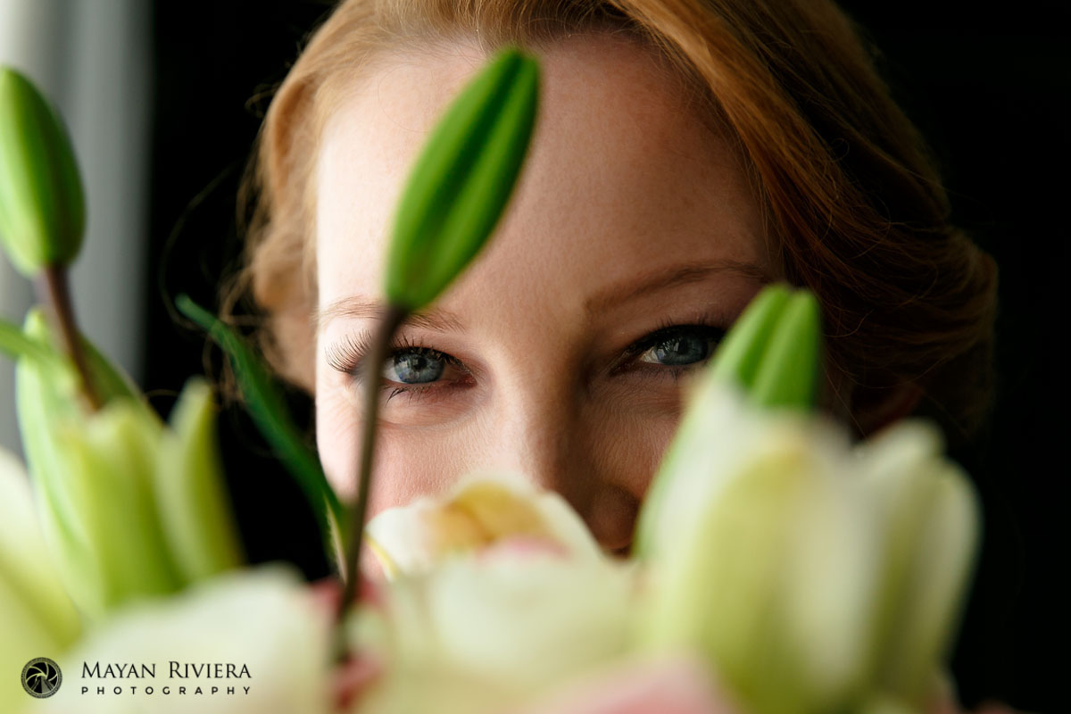 BrideLookingThruBouquet