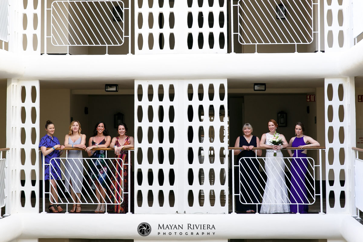BridalEntouragePosingOnBalcony