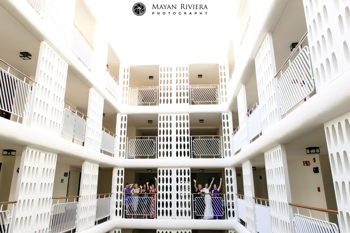 BridalEntourageCheeringOnBalcony