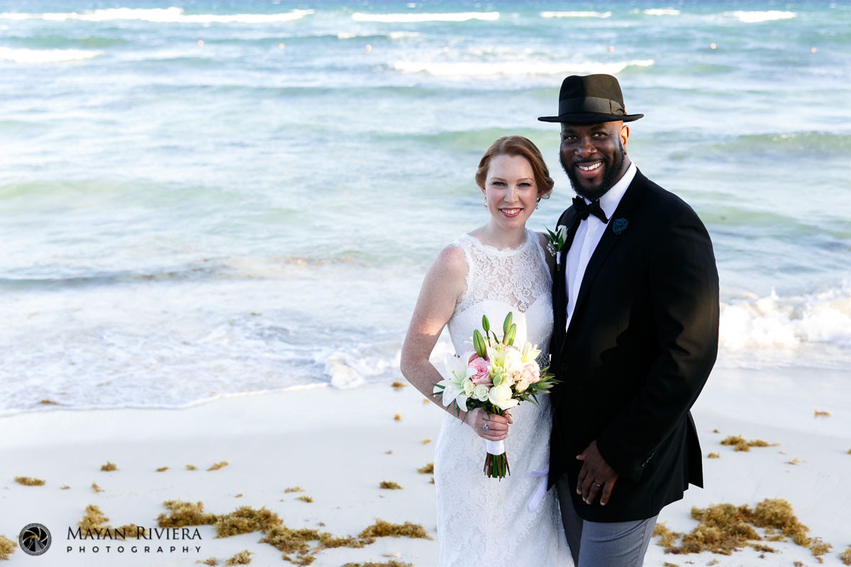 NewlywedsPoseOnBeach