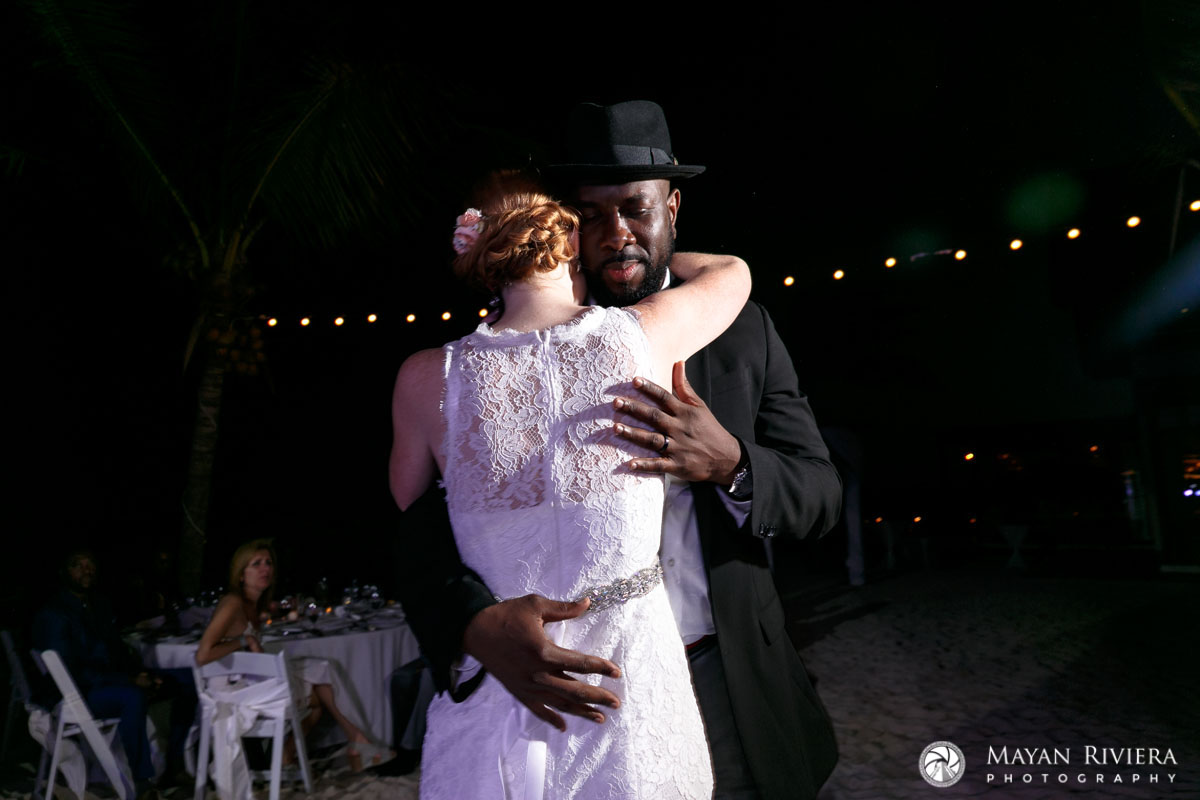 NewlywedsCuddleInFirstDance