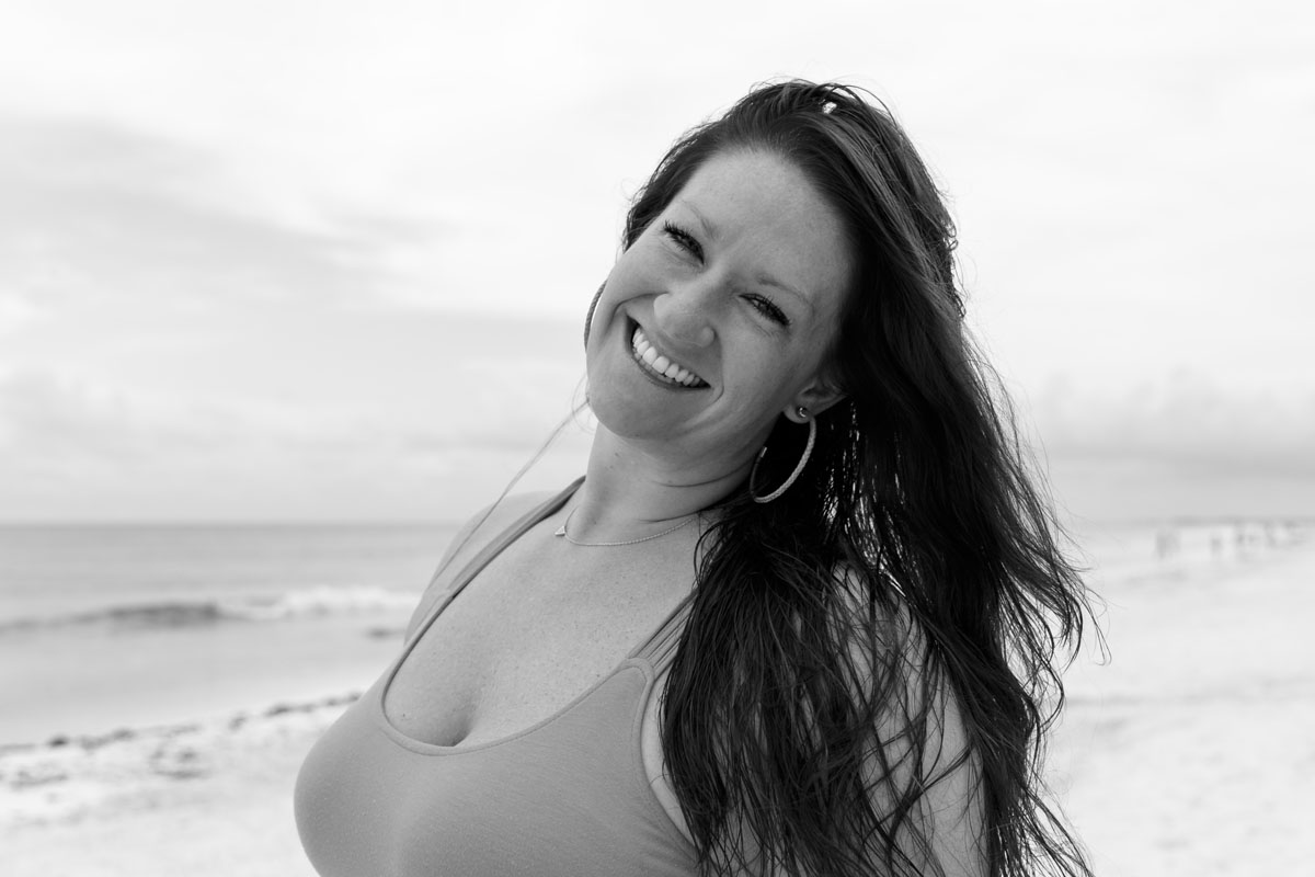 SmilingGirlPosesOnBeach