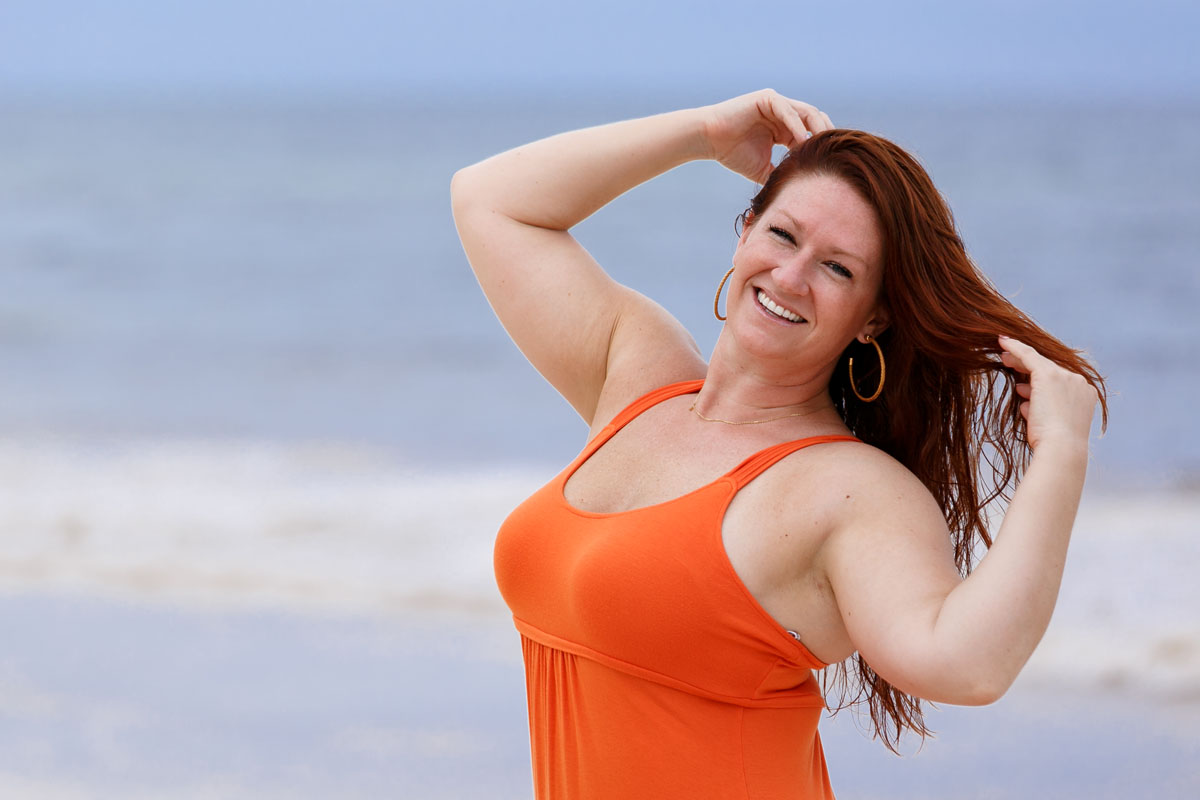 SmilingGirlPosesOnBeach