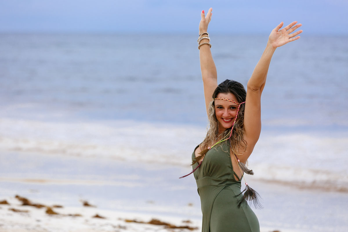 SmilingGirlPosesOnBeach
