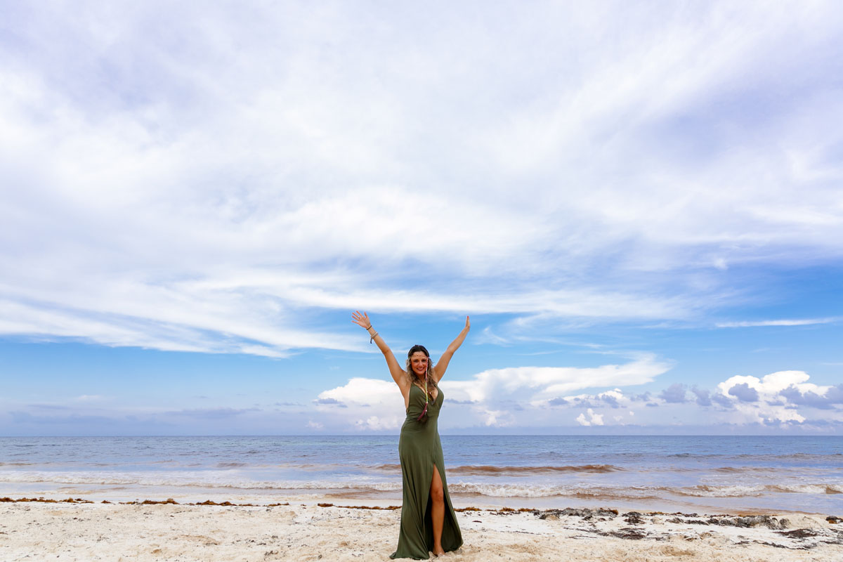 SmilingGirlPosesOnBeach