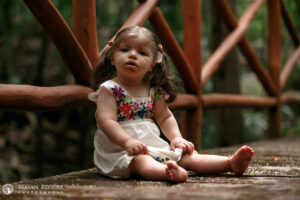 LilSisterSitsOnCenoteBridge