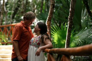 ParentsLeanOnCenoteBridge