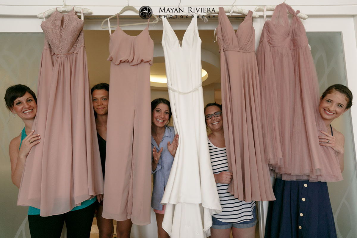 WeddingPartyAdmireTheirGowns