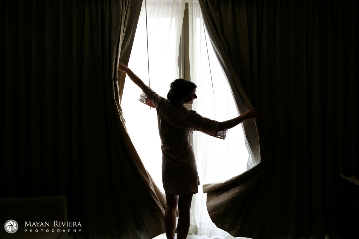 BrideTossesCurtainsOpen