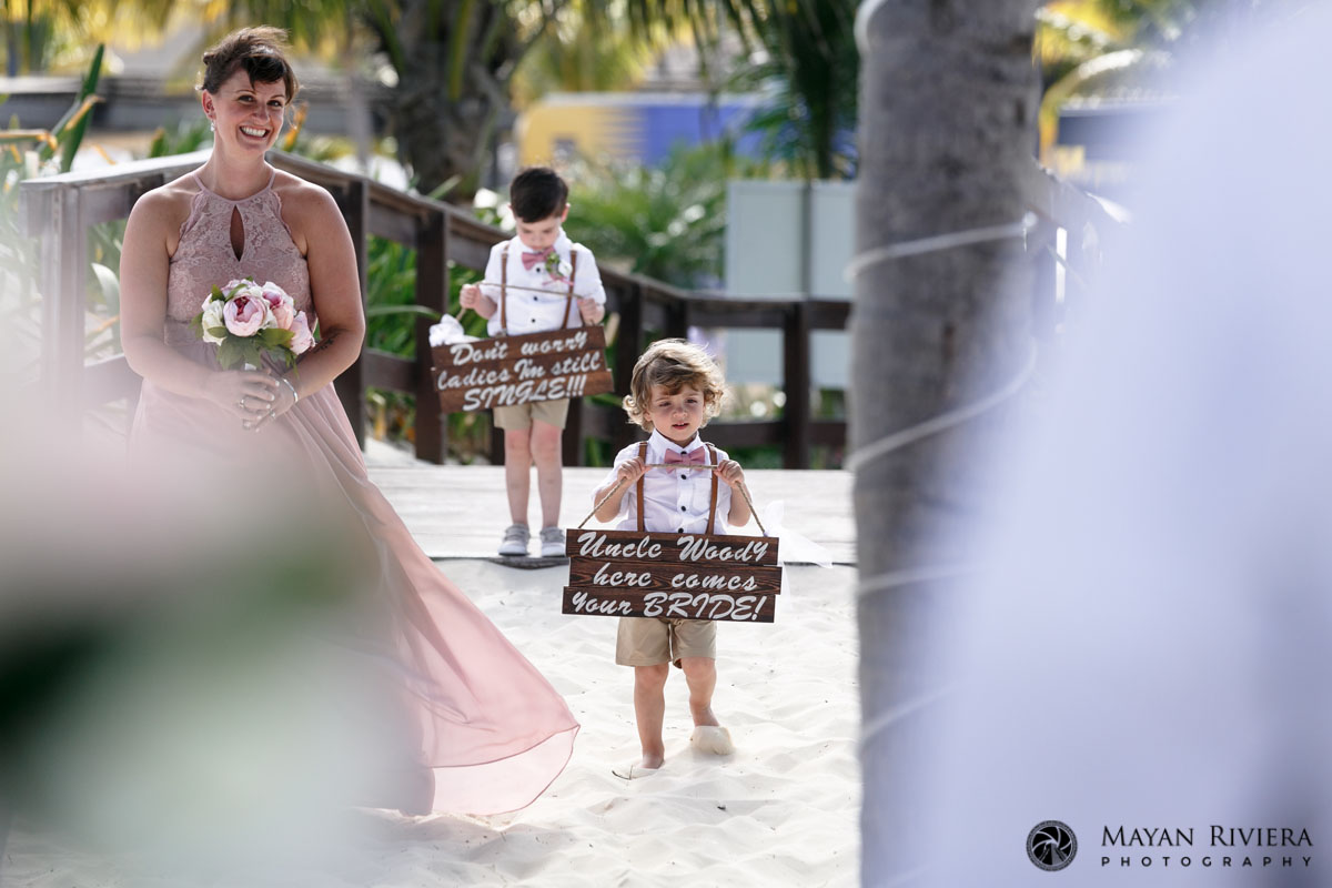 CuteBoysWalkInCarryingSigns