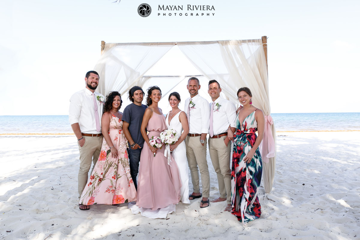 FamilyPosesOnBeachWithNewlyweds