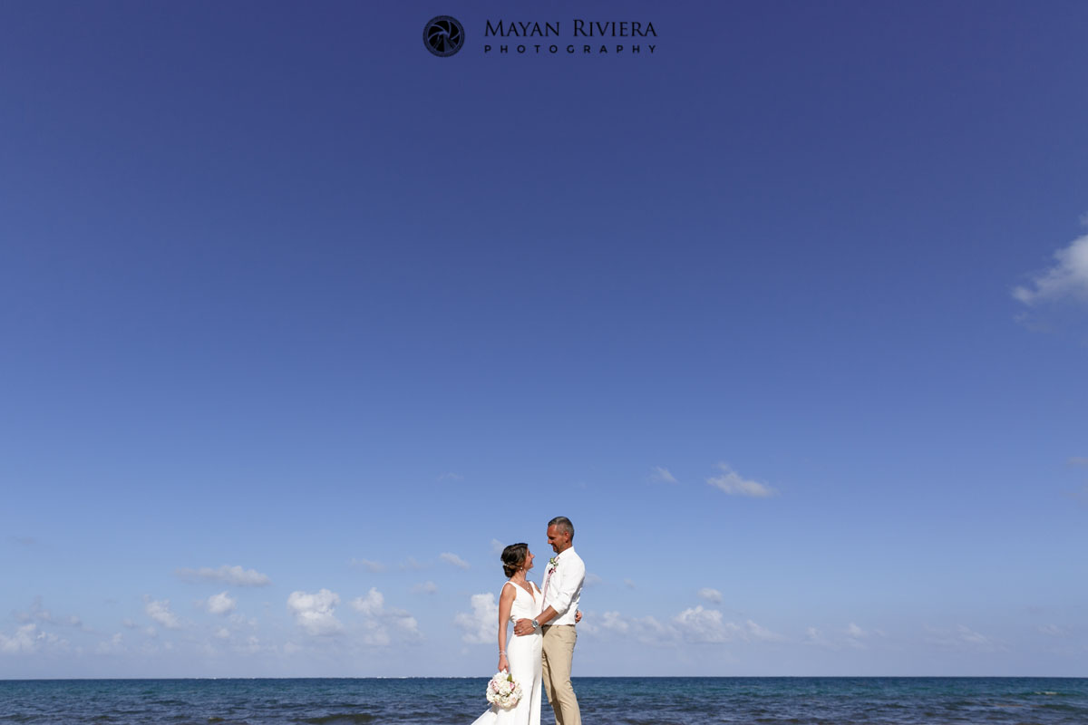 NewlywedsPoseOnBeach