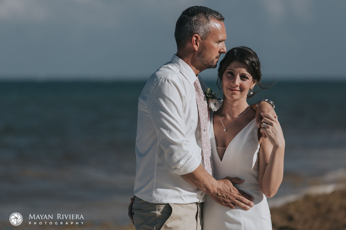 NewlywedsPoseOnBeach