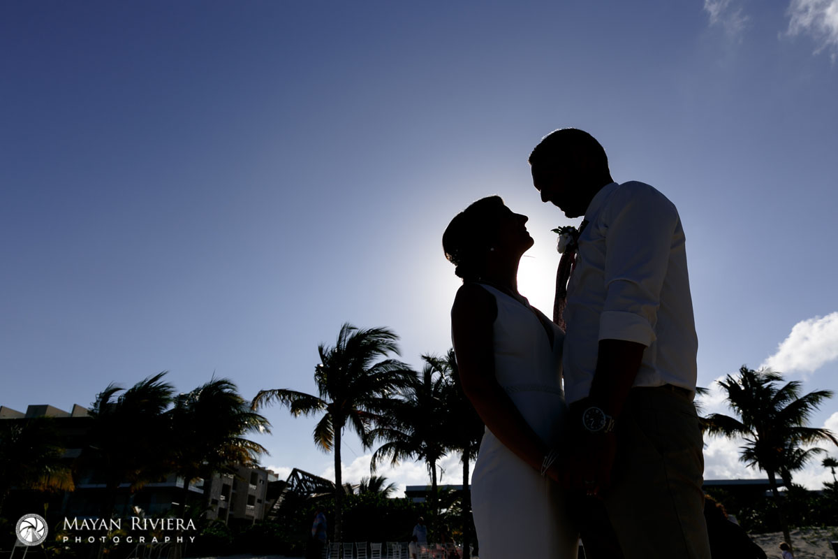 NewlywedsPoseOnBeach