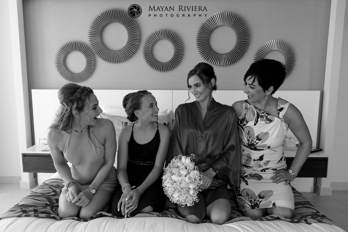 BrideSmilingAtWeddingParty