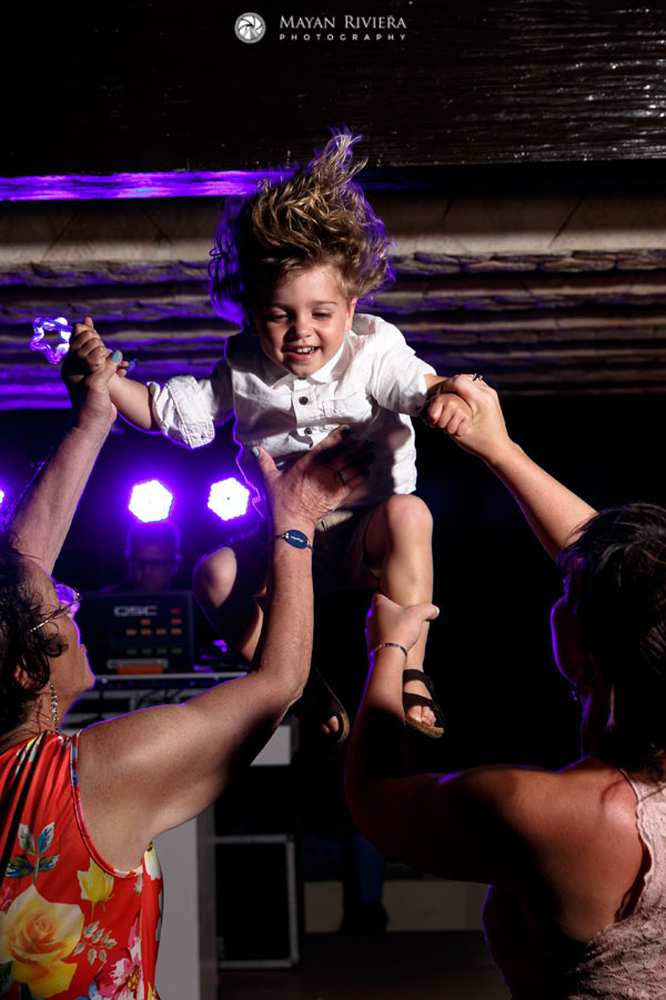 GuestsTossLaughingChildIntoAir