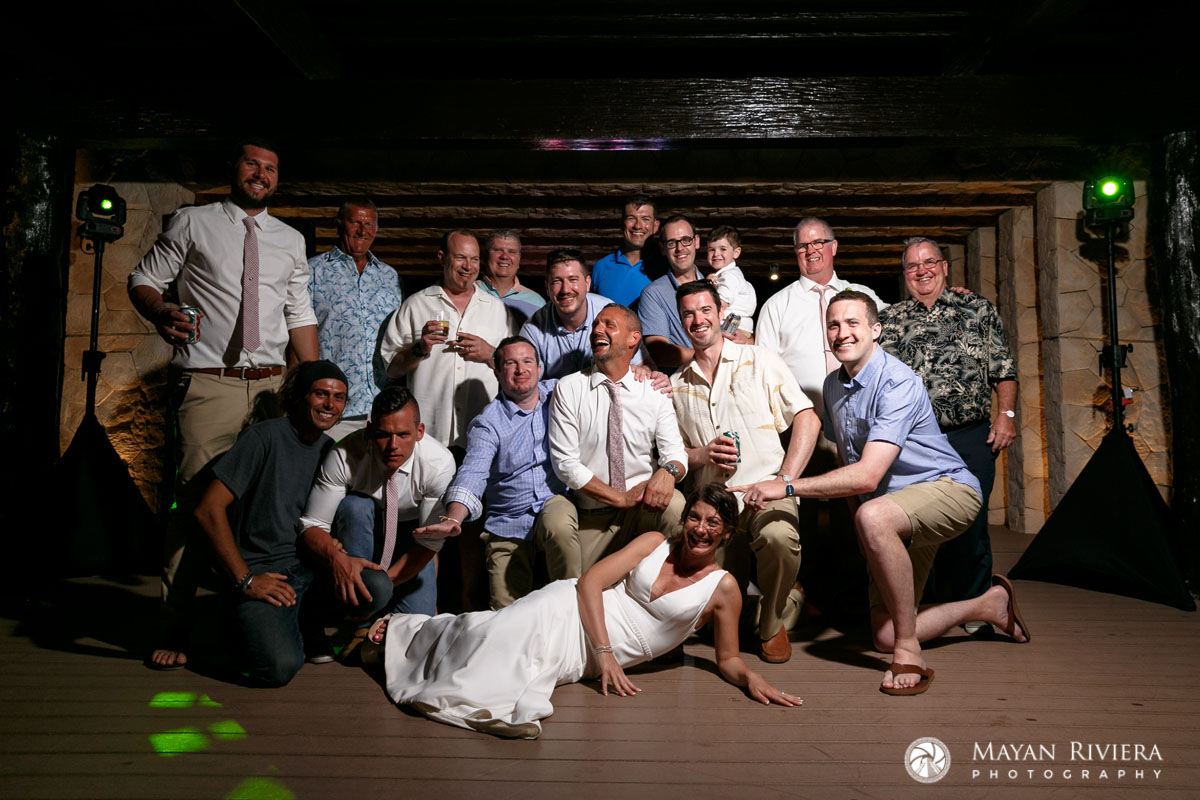 LaughingBrideReclinesInFrontOfGuys