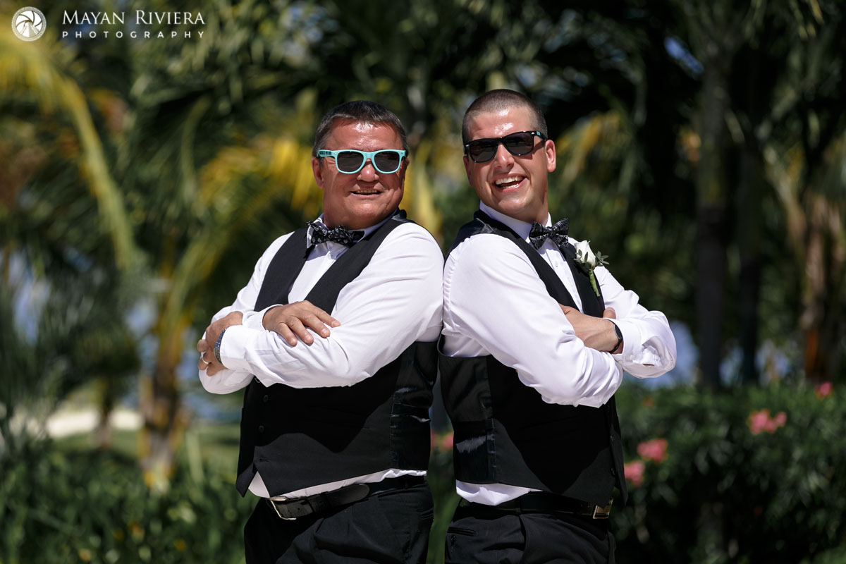 GroomStandsBackToBackWithDad