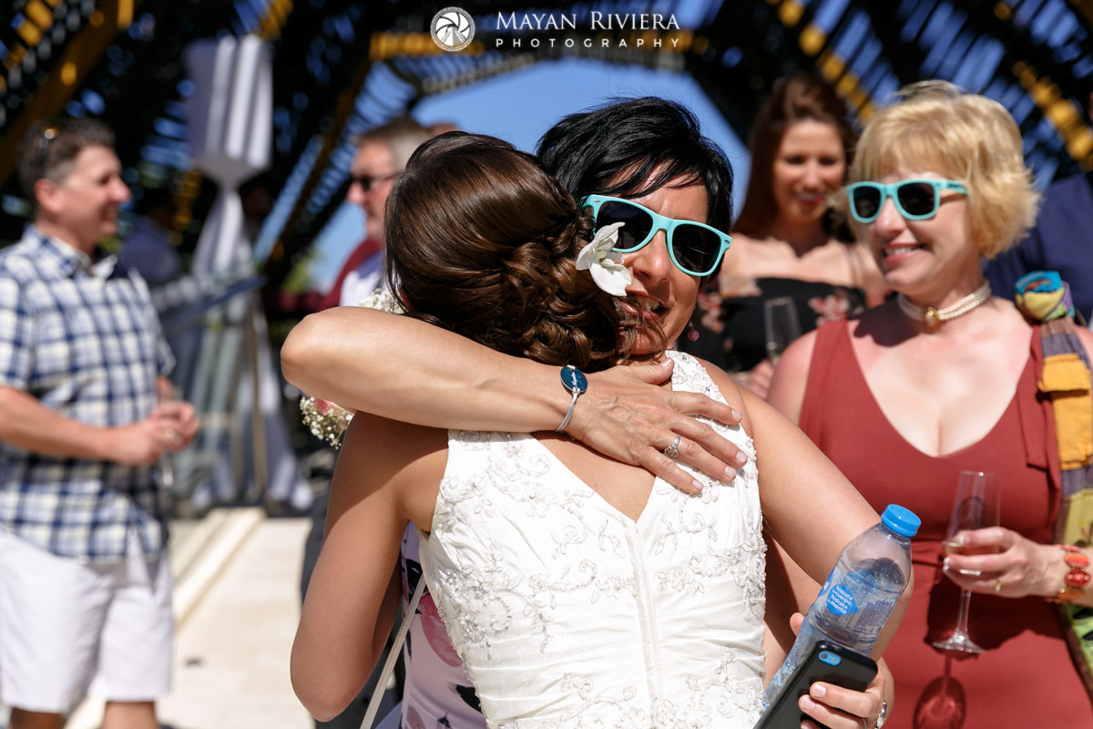 GuestsEmbraceNewlyweds