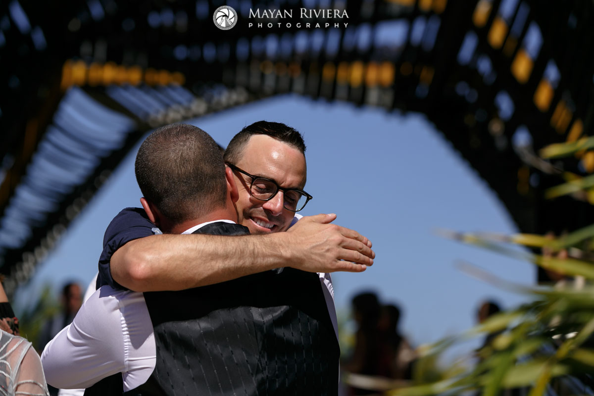 GuestsEmbraceNewlyweds