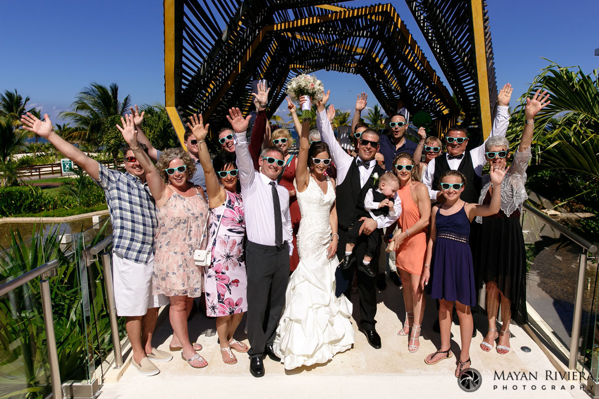 CheeringGuestsSurroundNewlyweds