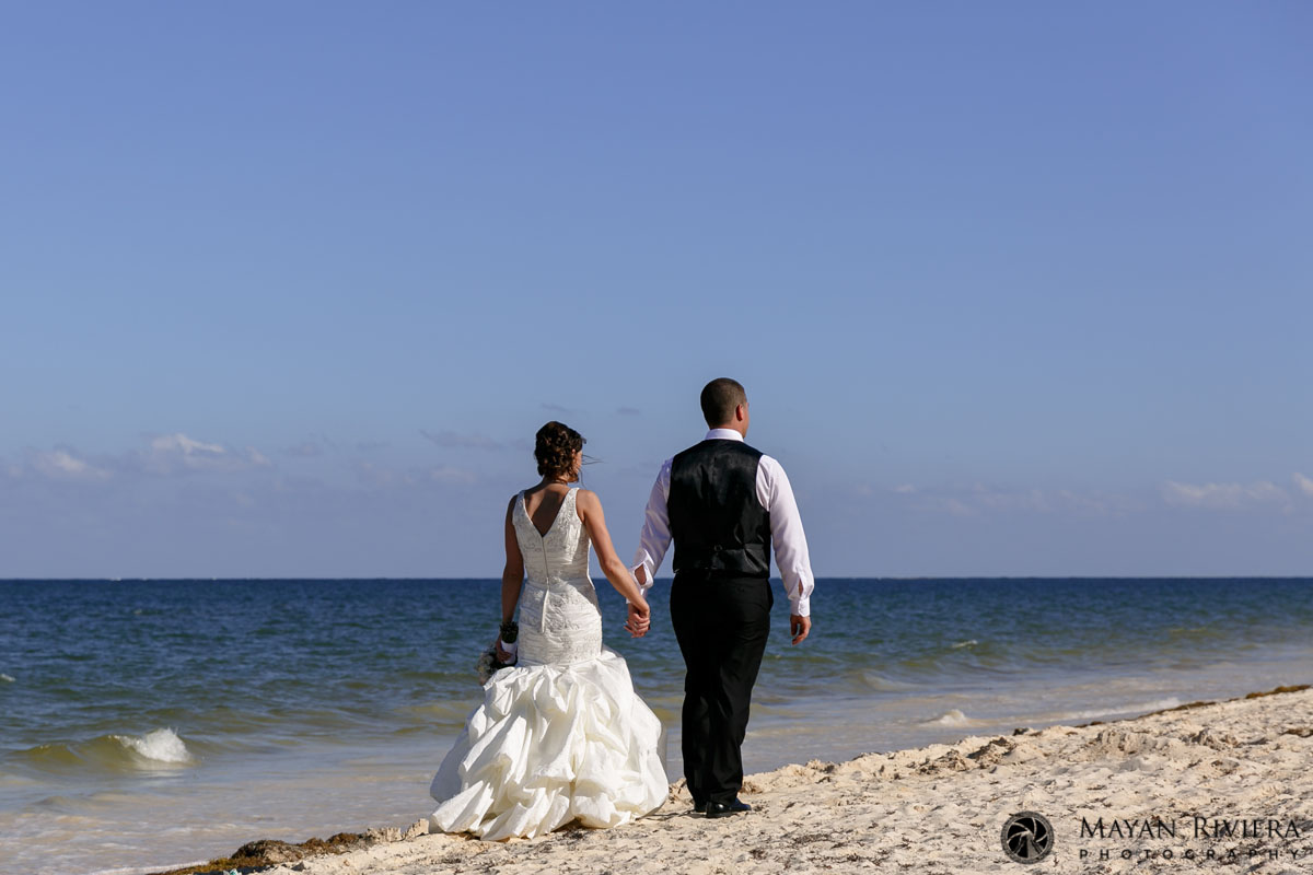 NewlywedsOnBeachWalk