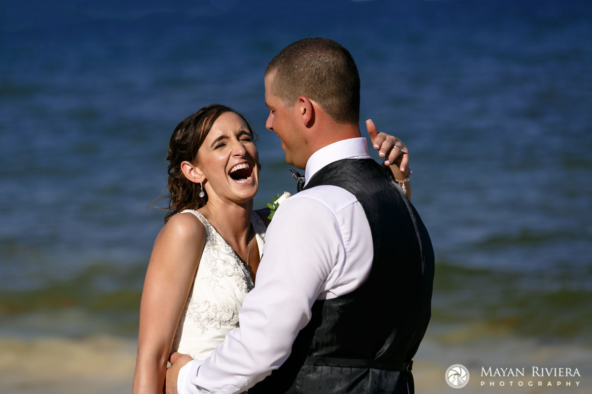 NewlywedsLaughOnBeach