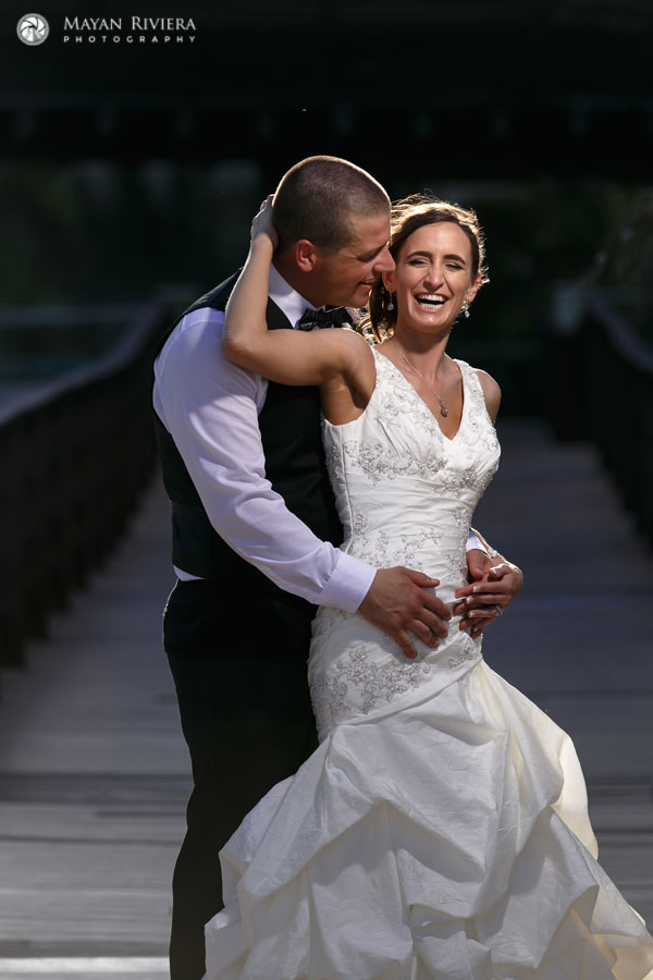 NewlywedsEmbraceOnPath