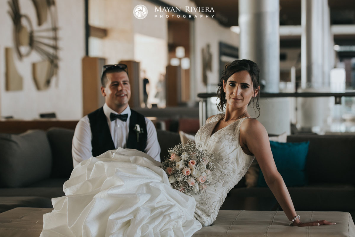 GroomGazesAtRecliningBride