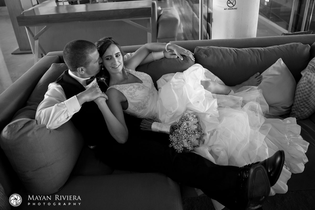 RecliningGroomKissesRecliningBride