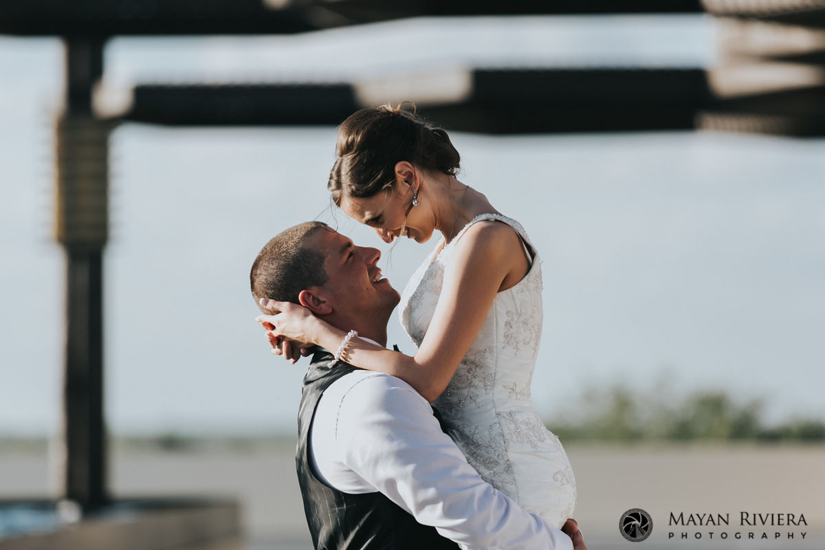 BrideJumpsIntoGroomsArms