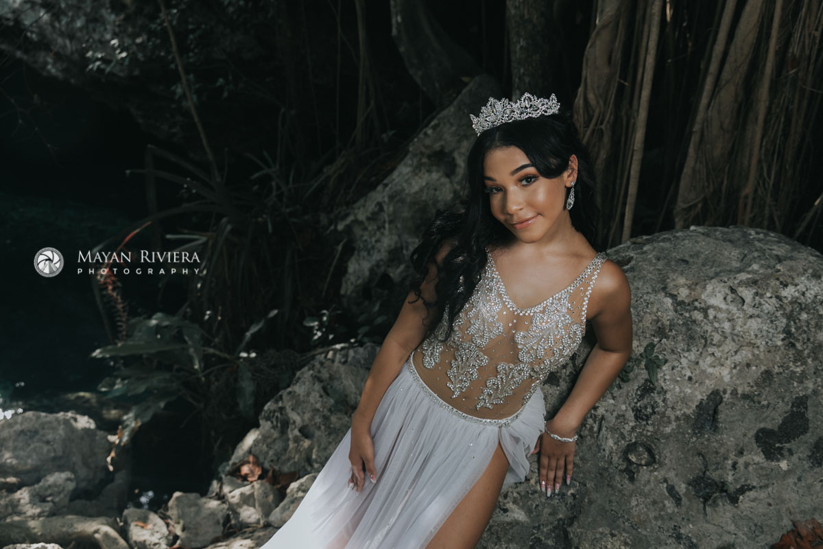 MelaniePosesOnCenoteRock