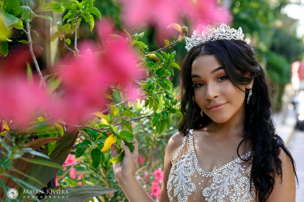 MelaniePosesWithJungleFlowers