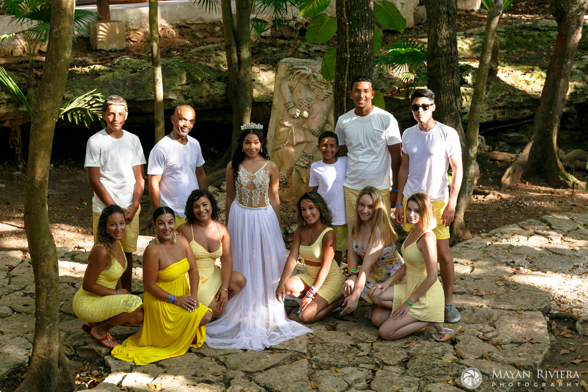 MelaniePosesByJungleStatueWithFamily