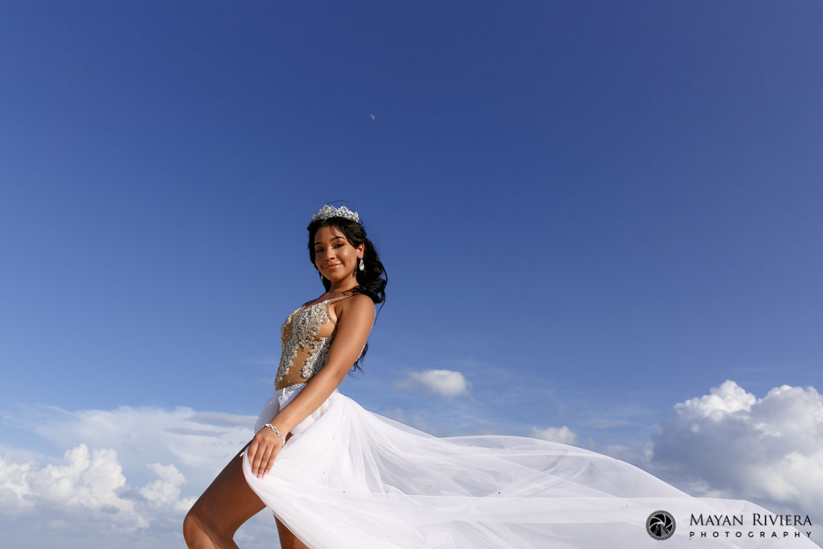 MelaniePosesWithFloatingSkirtOnBeach