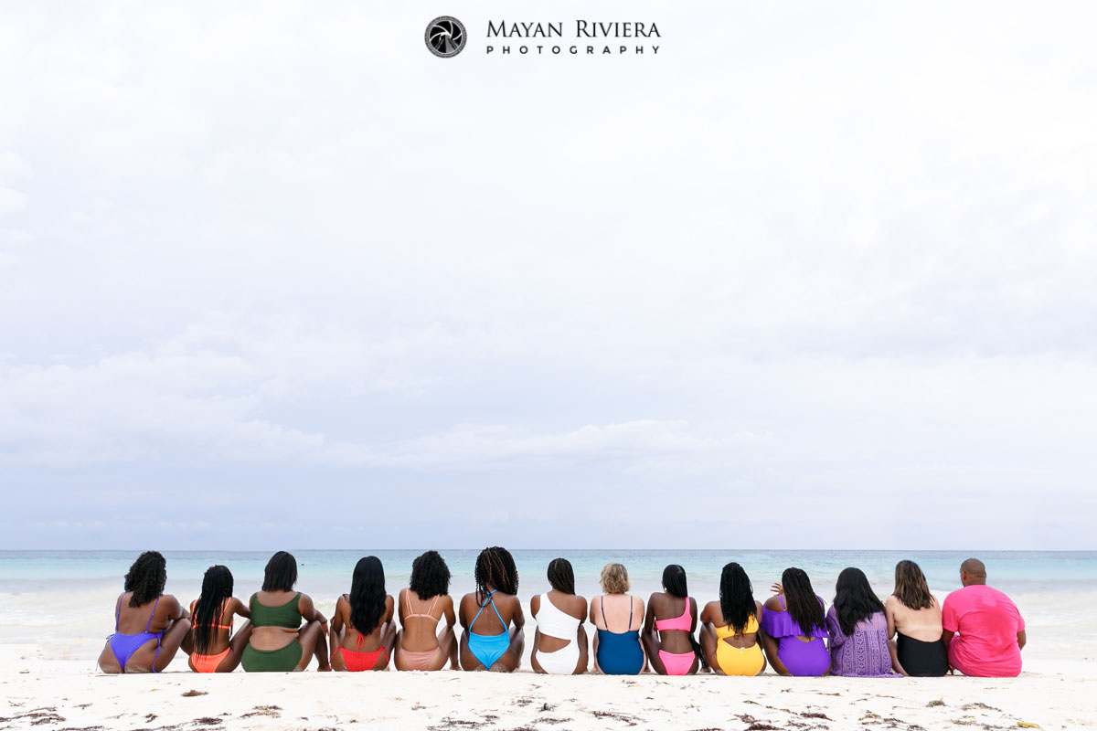 EntourageSitsOnBeachLookingOutToSea