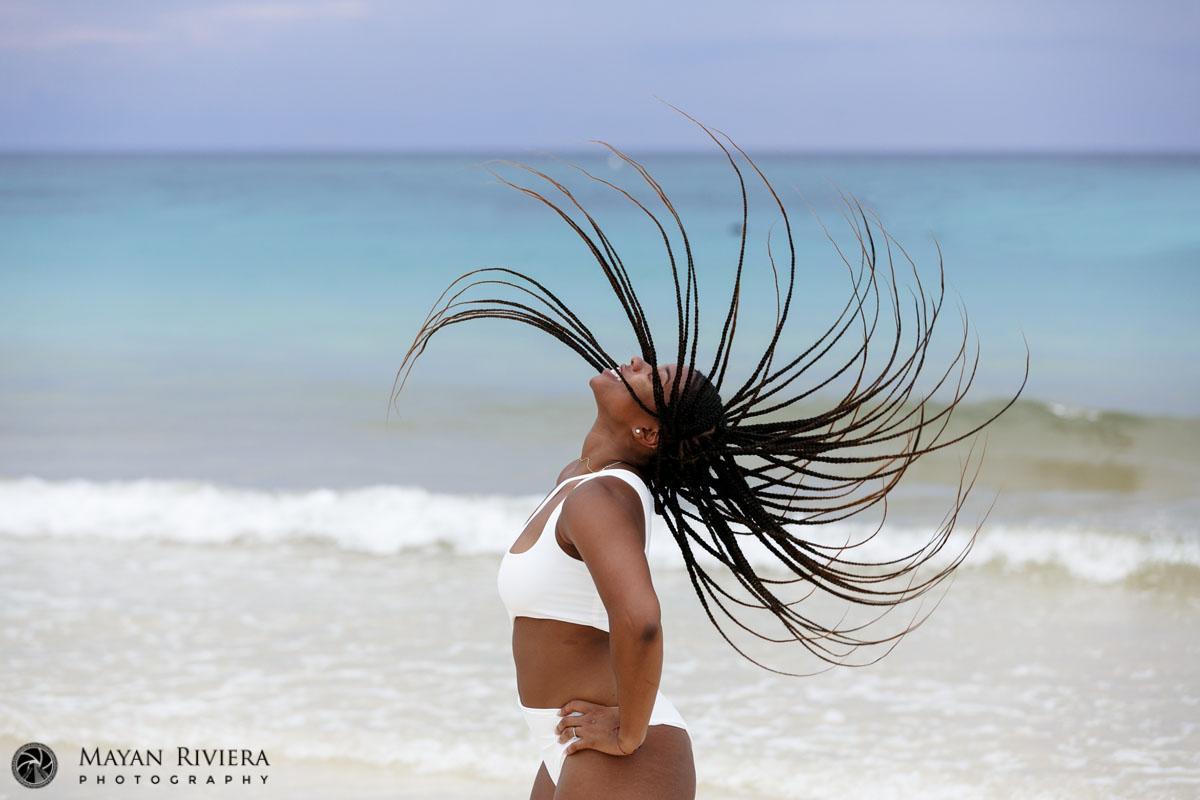 BrideFlingsHairInAFanAtWatersEdge