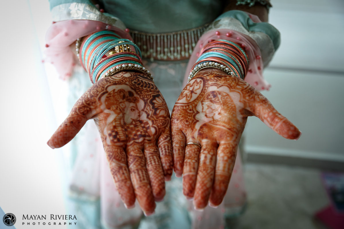 HinduBrideShowsMehndiHands