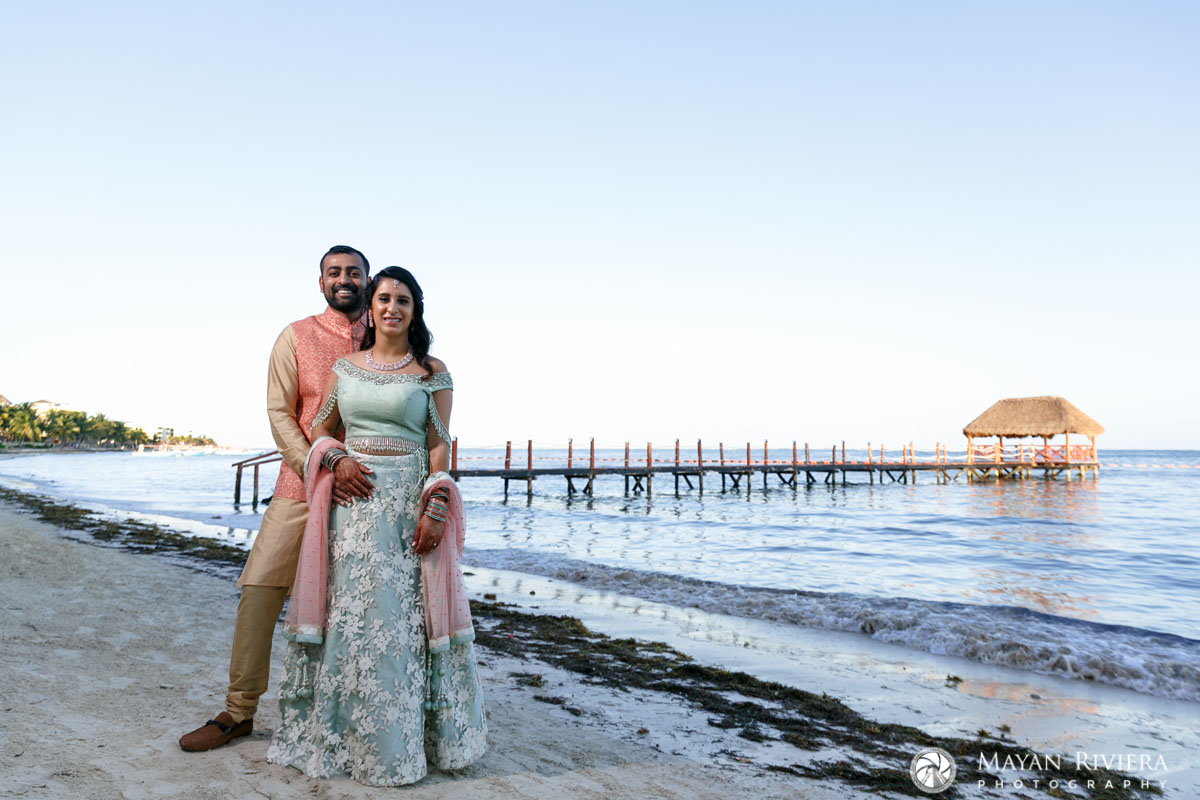 HinduWeddingCoupleStandsOnBeach