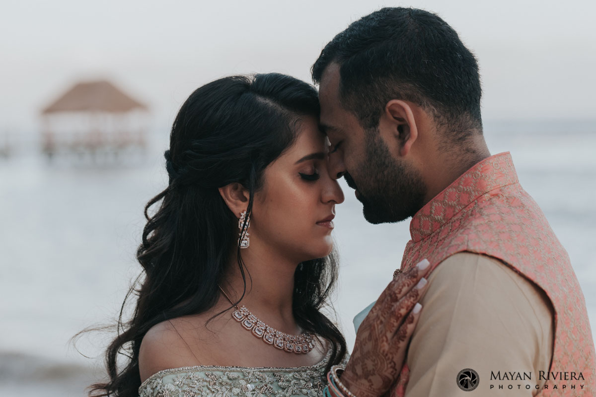 HinduWeddingCoupleKissingOnBeach