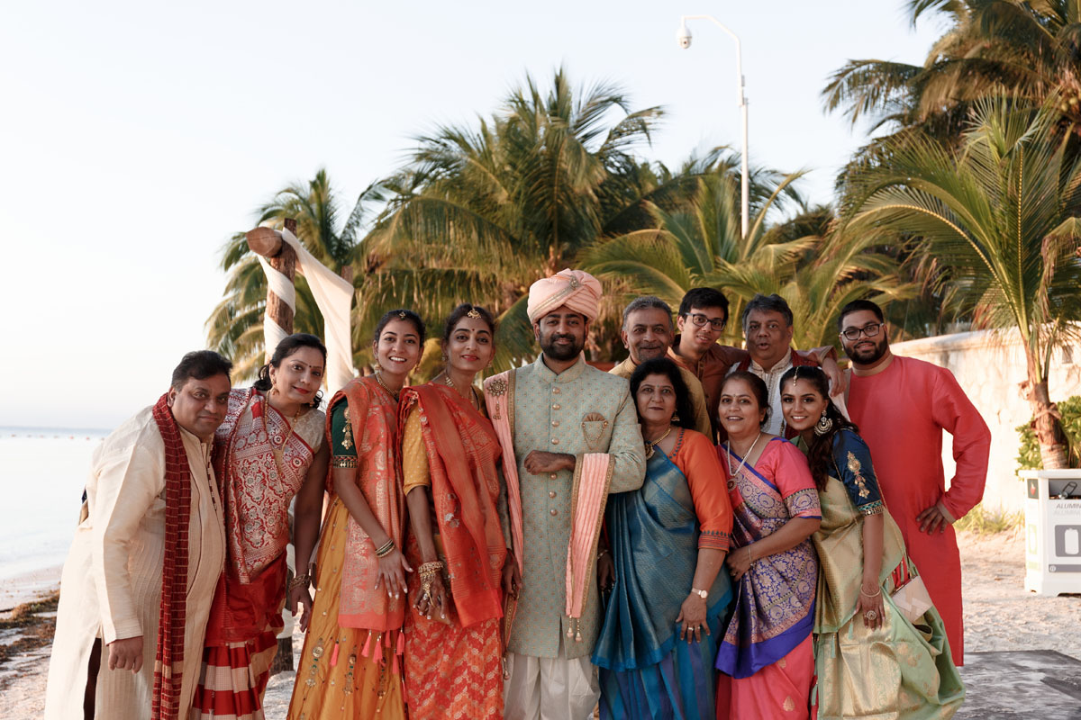 HinduGroomStandsWithGuests