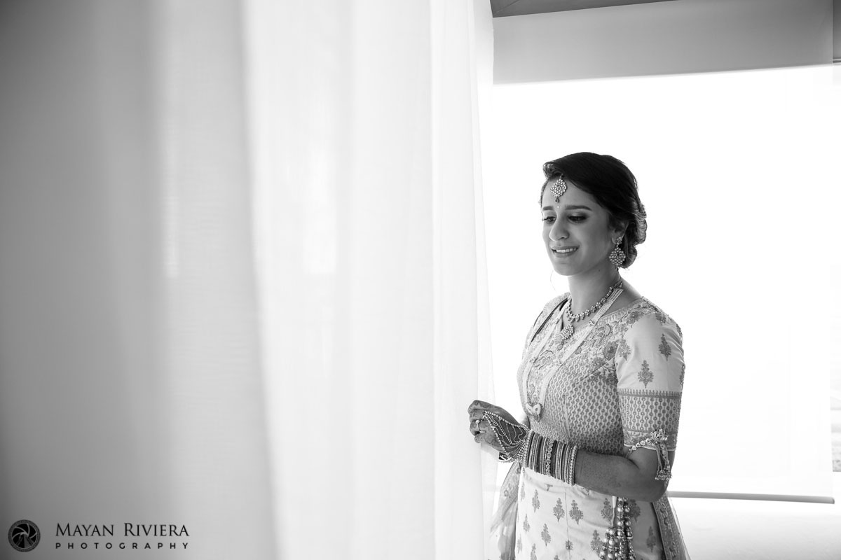 HappyHinduBridePosesByWindow